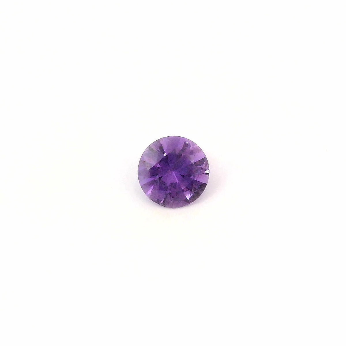 0.58ct Round Natural Sapphire (Colour Purple, Clarity Moderately Included, Cut Faceted)