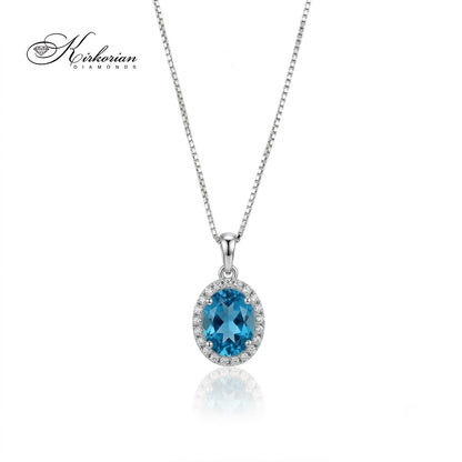 Колие от 14К бяло злато с естествен син топаз 1.26 ct и естествени диаманти 0.07 ct – елегантен овален медальон.