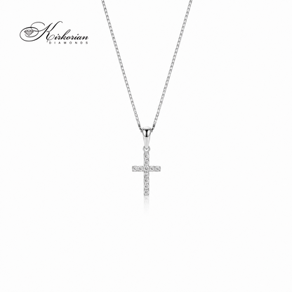 Дамско колие Kirkorian Diamonds с нежен религиозен кръст от 18К бяло злато, инкрустиран с прецизно подредени диаманти с общо тегло 0.11 карата, заснето на изчистен бял фон.