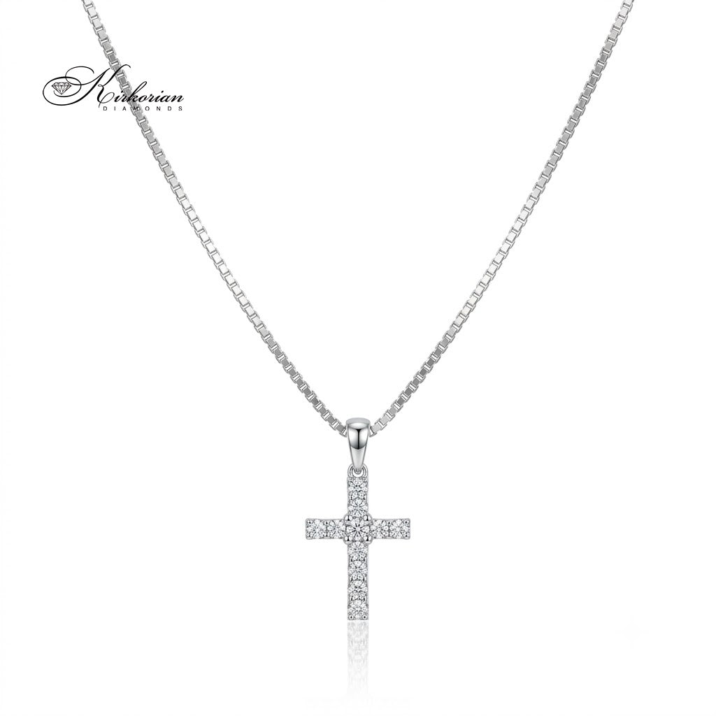 Елегантно дамско колие с кръст Kirkorian Diamonds, изработено от 14К бяло злато и инкрустирано с бляскави диаманти 0.21 ct, представено на нежна верижка върху чист бял фон.