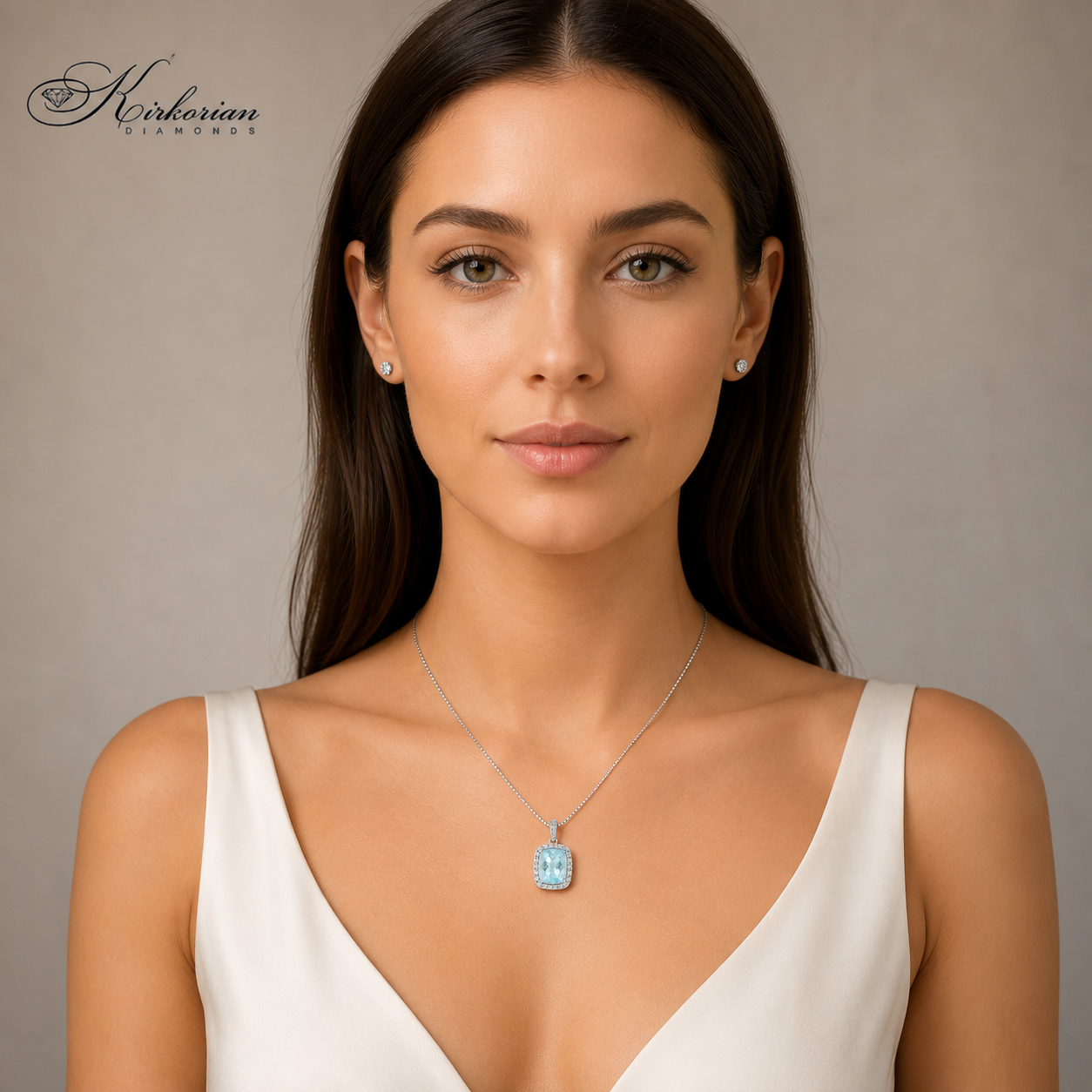 Дамски модел, носещ колие от бяло злато 18K с естествен топаз 2.00 ct и диаманти 0.23 ct – модел RN165 от Kirkorian Diamonds