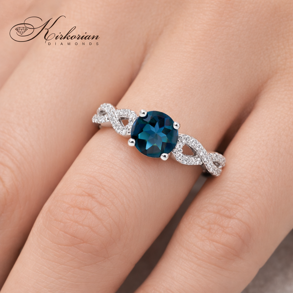 Годежен пръстен с Лондон Блу Топаз 0.80 ct и диаманти 0.15 ct от бяло злато 14К – лукс на достъпна цена