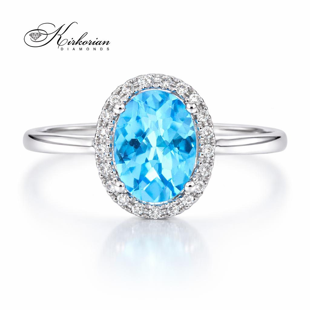 луксозен пръстен с овален син топаз и диаманти около камъка бяло злато RN22