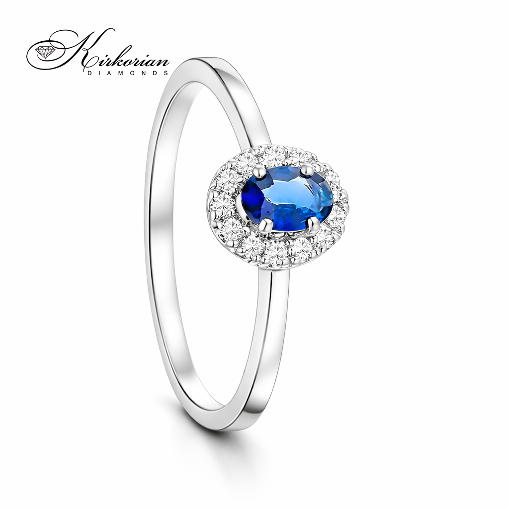 пръстен от бяло злато 18К със сапфир 0.25 ct и диаманти 0.09 ct модел S254346 елегантен дамски пръстен със син сапфир и диамантен ореол лукс на достъпна цена Kirkorian Diamonds