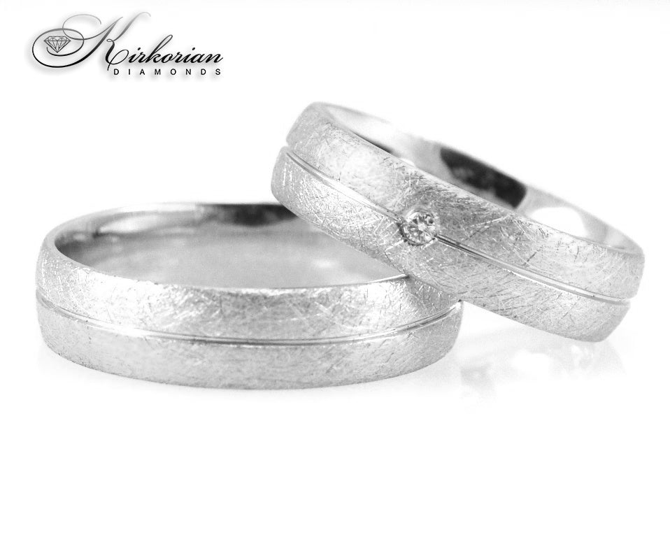 Брачни халки от бяло и жълто злато с диамант 0.02ct – модел WRD096