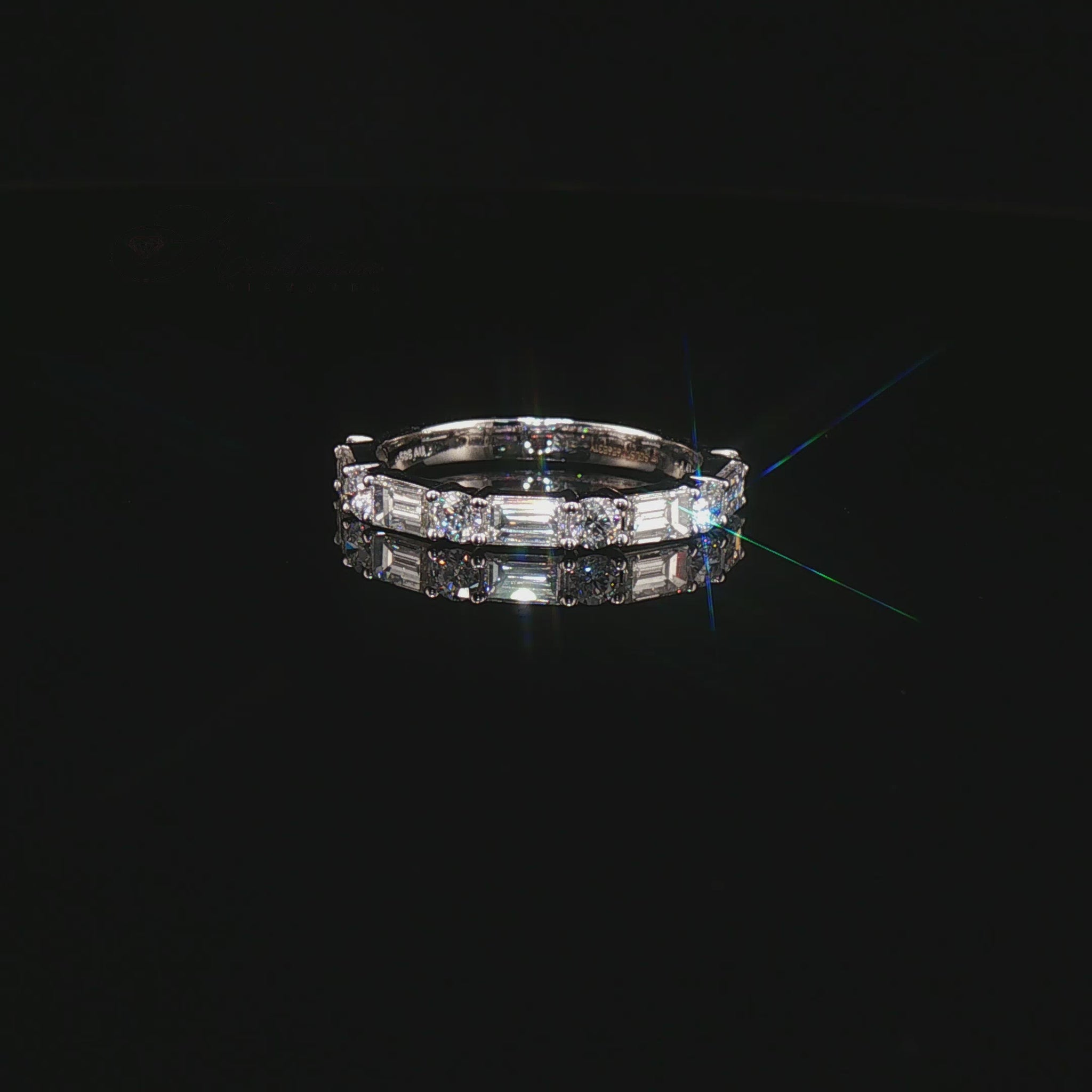 Видео на луксозна брачна халка Premium Eternity Ring от бяло злато 14К с естествени диаманти с общо тегло 1.41 карата модел LR12199 от Kirkorian Diamonds. Елегантен eternity дизайн с редуващи се Round Brilliant и Baguette диаманти, които създават впечатляваща игра на светлина, максимален блясък и изключително луксозно излъчване. Изискан модел за сватба, годишнина или специален подарък.
