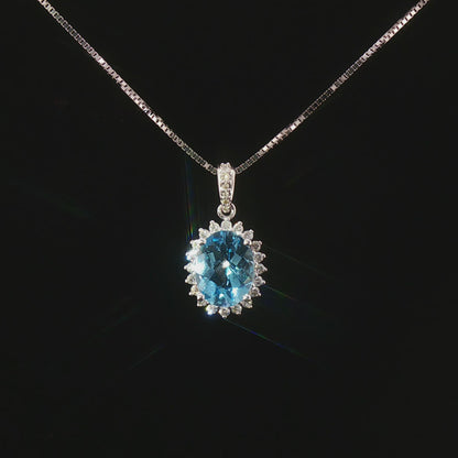 Видео на колие от 14К бяло злато с естествен топаз 1.86 ct и естествени диаманти 0.20 ct – класически луксозен дизайн от Kirkorian Diamonds.