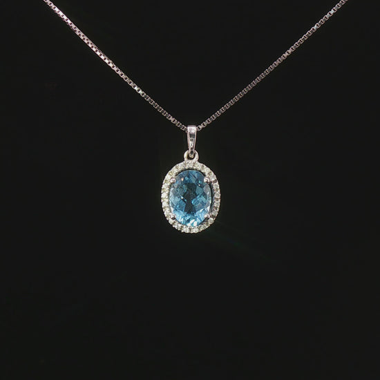 Видео на колие от 14К бяло злато с естествен син топаз 1.26 ct и естествени диаманти 0.07 ct – модел KN2 от Kirkorian Diamonds.