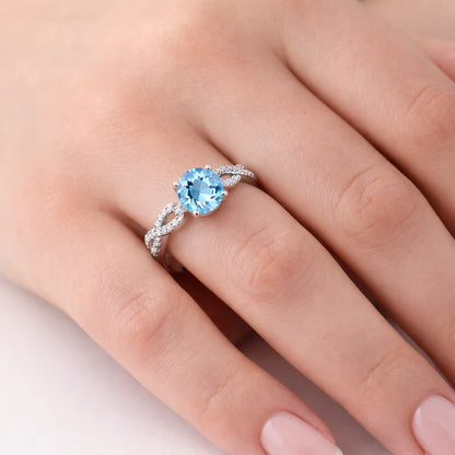 годежен пръстен с топаз и диаманти бяло злато 14К на ръка