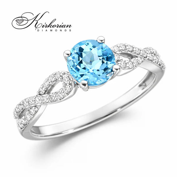 Годежен пръстен с топаз 0.80 ct и диаманти 0.15 ct от бяло злато 14К – елегантен пръстен с естествени диаманти | модел RN174B