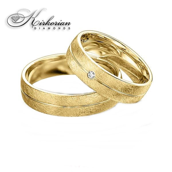 Брачни халки от бяло и жълто злато с диамант 0.02ct – модел WRD096