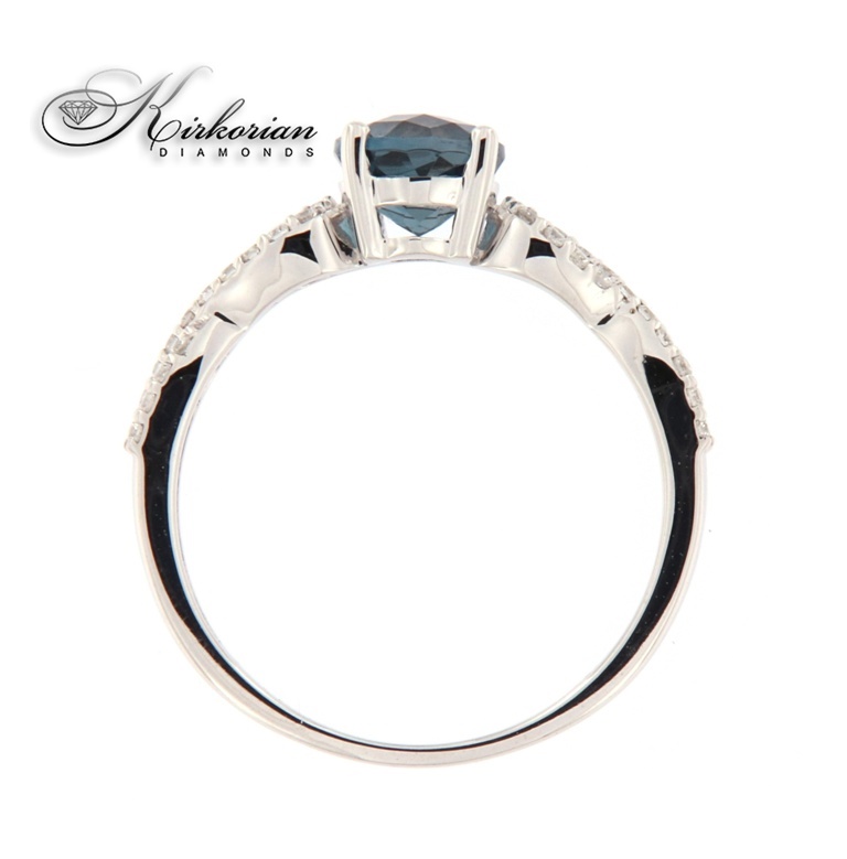 Годежен пръстен 18к. с топаз лондон и диаманти 0.15 карата код:RN174